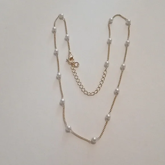 #1110. 5 Piece Assorted Gold Toned Pendant And Faux Pearl Necklace Bundle - Picture 9 of 10